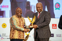 Mr Joseph Cudjoe received his award from former President John Mahama.