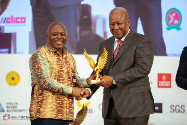 Mr Joseph Cudjoe received his award from former President John Mahama.