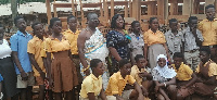 The MP with some of the pupils in a group photo