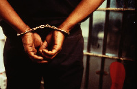 Representational photo of a man in handcuffs