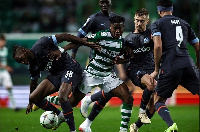 Sporting Lisbon winger, Fatawu Issahaku crowded by Marseille players