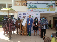 Mr Peter Maala, the Chief Director of the Upper West RCC in a group picture with other dignitaries