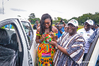 Alhaji Dr. Bawumia presenting an award to the winner of the '2019 Ghana Teacher Prize'