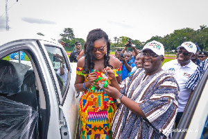 A teacher being presented with a car by Vice President, Mahamudu Bawumia