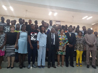 Kwaku Agyaman-Manu (middle) in a group photograph with the awardees