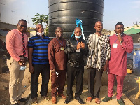 Jacob Gbati CSP Nii Armah Ashitey and Henry Gbati with some officials of the prison