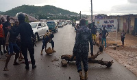 The agitated youth blocked the road with cement blocks and firewood