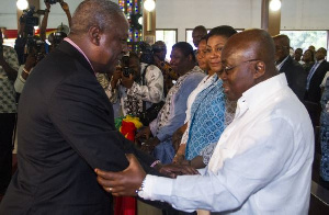 Nana Addo shakes hands with President Mahama