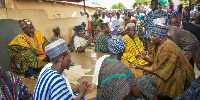 Dr. Mahamudu Bawumia paying his respect to the chief