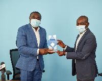 Managing Director of FanMilk PLC, Ziobeieton Yeo (right), receiving his award