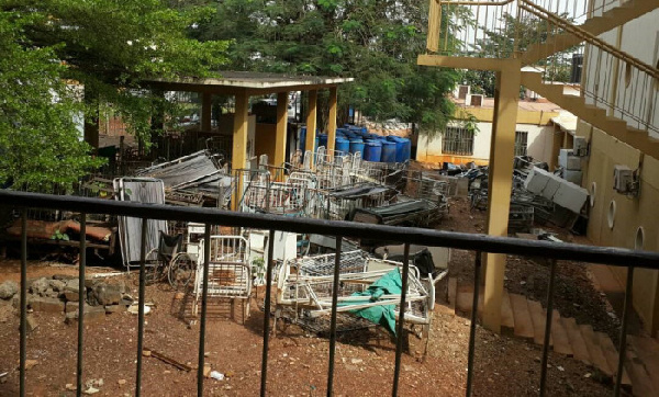 Abandoned broken hospital beds rusting away