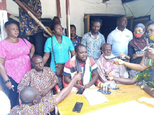 James Kofi Annan speaking to the press