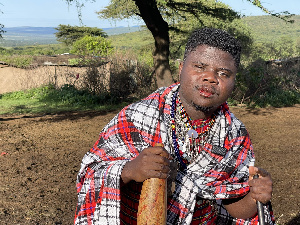 Wode Maya with cow blood in his hand