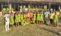 Betty Nana Afua Crosbi Mensah with some students