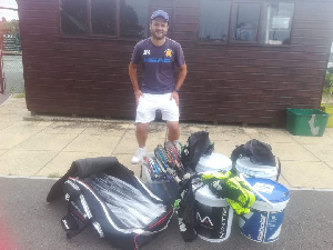 Luis Marque with the items donated