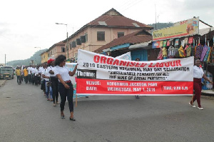 Members of organised labour marching to Jackson Park for May Day celebrations in Koforidua