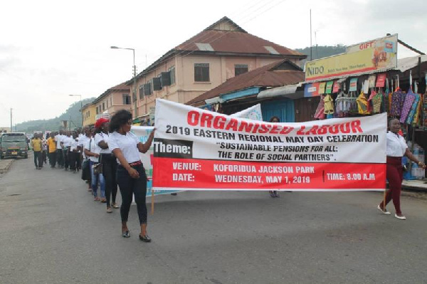 Members of organised labour marching to Jackson Park for May Day celebrations in Koforidua