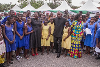 President John Dramani Mahama with Nana Oye Lithur and some students