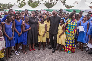 President John Dramani Mahama with Nana Oye Lithur and some students