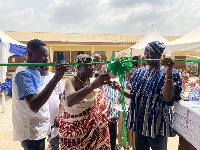 Chief of katamanso cutting sod for the renovated building