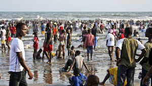 People enjoying themselves at the beach