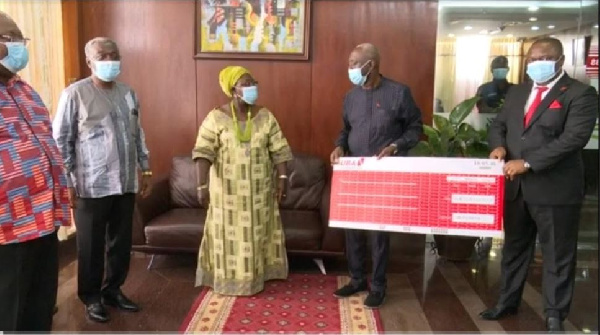 Chief of Staff Frema Ashkar receiving the donation from Senior Executives of UBA