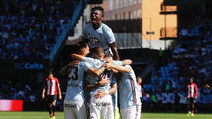 Aidoo joins his teammates to celebrate their victory