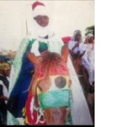 The 'wanted' Chief riding on a horse during a ceremony