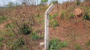 A pillar put up on the plot of land to serve as boundary