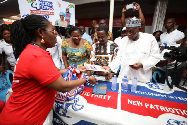 Mrs Ursula Owusu-Ekuful hands over forms to party executives