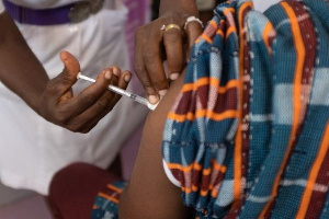 A medic administers a Coronavirus jab | File photo