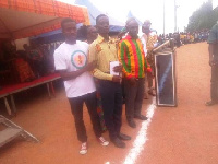 Awardees in a photograph with the Agona East DCE