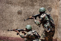 Malian soldiers  take position during training in urban combat