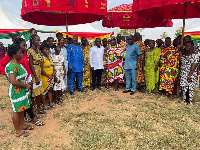 Collins Adomako-Mensah with traditional leaders and the beneficiaries