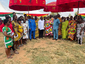 Collins Adomako-Mensah with traditional leaders and the beneficiaries