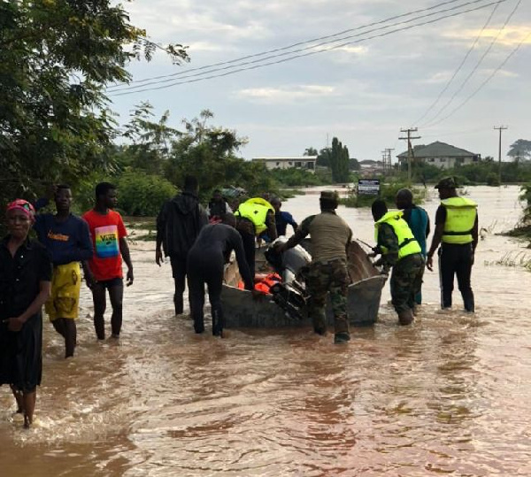 Personnel of Operation Boafo from 2 Garrison helping displaced persons