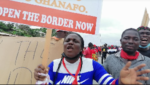 Some aggrieved residents storm the street of Elubo to protest the border closure