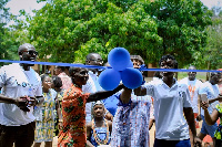 BMW Club Ghana President, Kojo Oppong and Dr. Asante Appiah presenting items to the Headmistress