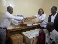 Adwoa Odom(R) making the presentation on behalf of Unity Link