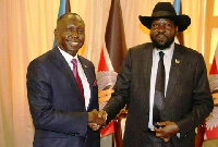 Ambassador Simon Michael Duku (left) and South Sudanese President Salva Kiir (right) in hand shake