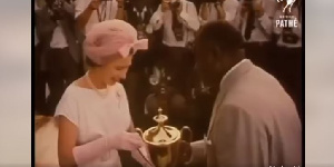 Nathaniel Heward-Mills is seen here being presented with an award by Queen Elizabeth II