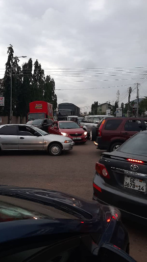 Elikem was seen busily directing traffic at an intersection in Dzorwulu