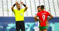 Referee Glenn Nyberg gestures after VAR disallowed Argentina's second goal