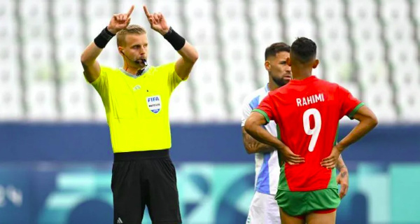 Referee Glenn Nyberg gestures after VAR disallowed Argentina's second goal