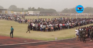 Hundreds line up at a recent recruitment into the Immigration Service