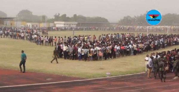 Hundreds line up at a recent recruitment into the Immigration Service