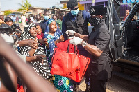 Nana Kwame Bediako handing out goodies to some of the beneficiaries