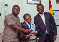 NSS boss, Mustapha Usif (Right) together with other officials holding the plaque