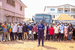 Dr. Yaw Osei Adutwum in a group photo with the 61 students