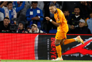 Kylian Mbappe celebrates after scoring the 0-2 goal during the Spanish LaLiga soccer match